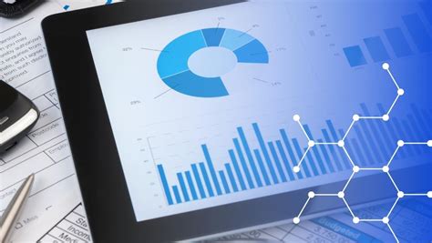 A close-up of a tablet showing financial or business analytics, represented by a pie chart and bar graph, with a subtle chemical formula graphic suggesting innovation or detailed analysis.