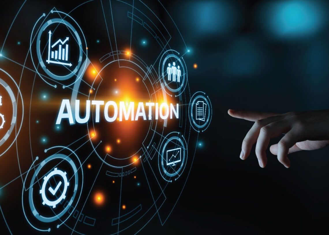 A visual metaphor for technological automation, displaying glowing icons and the word "AUTOMATION" being interacted with by a human hand.
