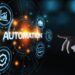 A visual metaphor for technological automation, displaying glowing icons and the word "AUTOMATION" being interacted with by a human hand.